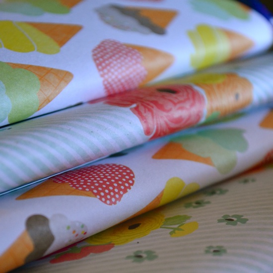candy bars wrapped in cute scrapbook paper for a baby shower // the lovely bee
